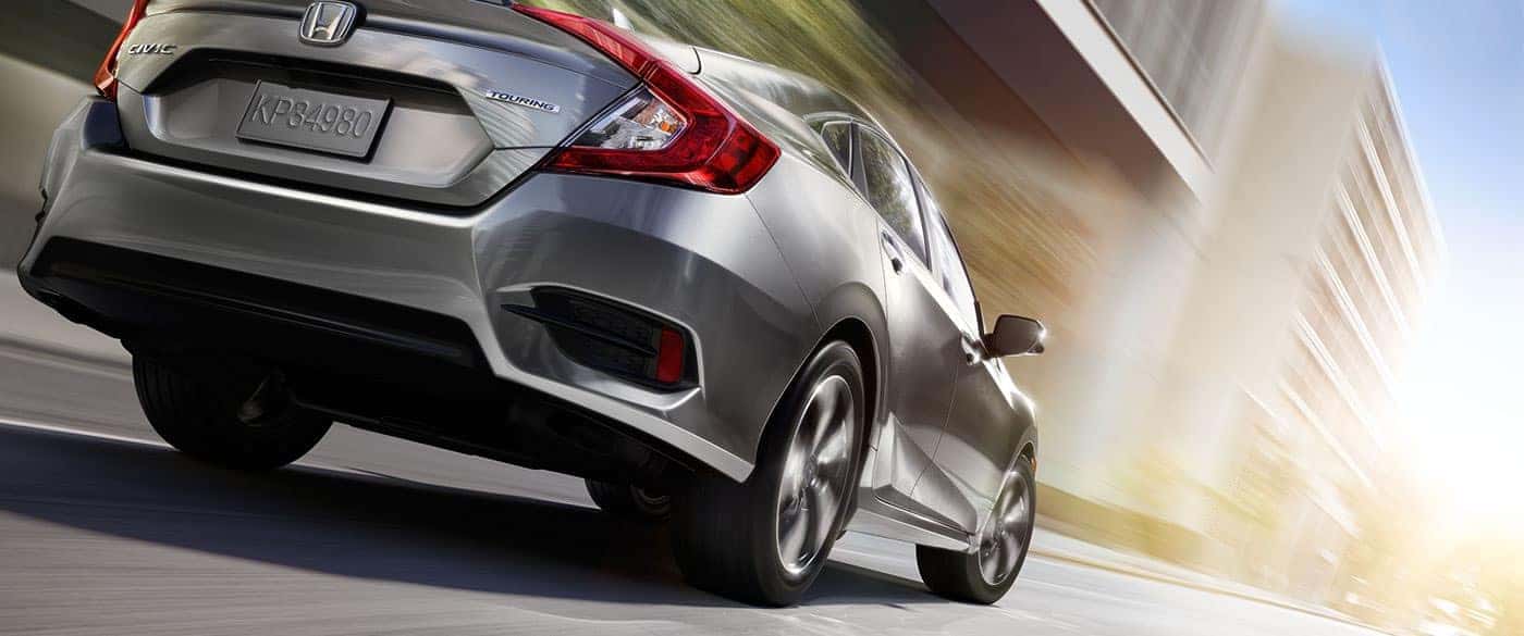 2018 civic sedan touring ext nh 830 78 rear pass driving city