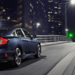 2020 Honda Civic on the highway at night