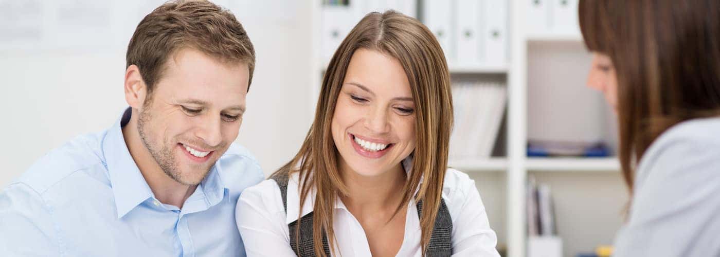 Young Couple Looking Over Paperwork