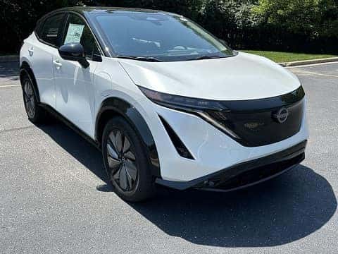 white 2025 Nissan Ariya EV parked at the Gordie Boucher Nissan dealership