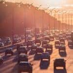 cars driving down a road
