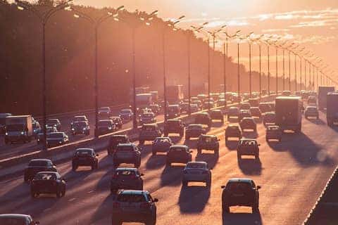 cars driving down a road