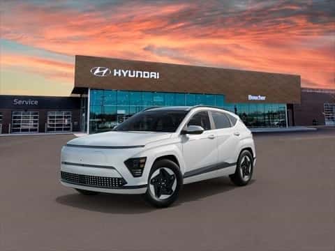 white 2025 Hyundai Kona electric SUV parked at a Boucher Auto Group dealership