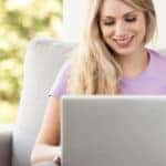Smiling person online shopping