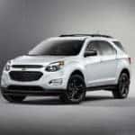 White Chevy Equinox against a grey background