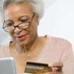 Woman using credit card