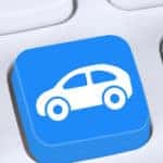 A blue button on a keyboard for searching used cars