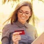 A woman approved for a no credit car loan in Indianapolis via her tablet