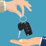 A pair of cartoons exchanging the keys to a new car