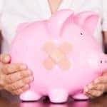 A piggy bank showing the signs of bad credit