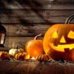 Pumpkins and Halloween decorations are lit up.