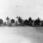 You'd be hard pressed to find one of these used cars in Indianapolis, the starting line of a race from 1910 is shown in black and white.