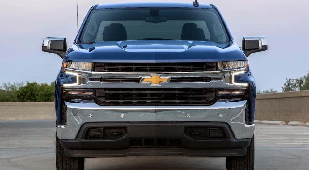 A blue 2019 used Chevy Silverado that you can buy online is shown from the front.