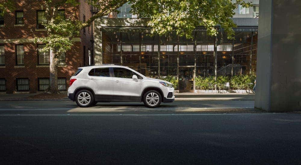A white 2018 Chevy Trax is shown from the side in front of a cafe after leaving a used car dealer in Cincinnati.