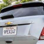 A silver 2020 Chevy Trax LT is shown from the rear.