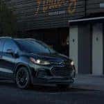 A black 2021 Chevy Trax is parked outside of a record store after shopping on an online car dealer in Louisville.