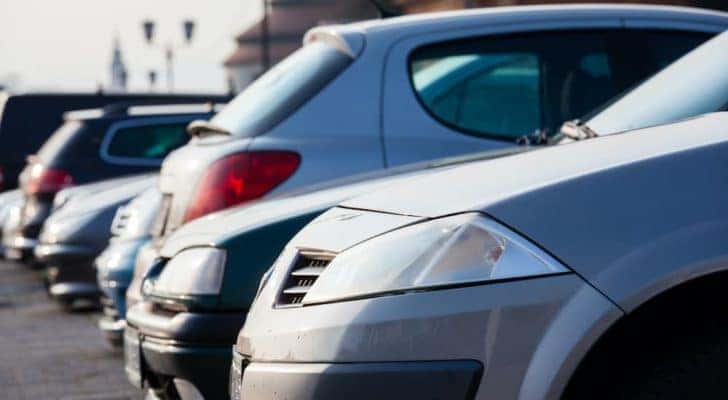 A close up shows a used car lot in Indianapolis.