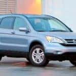 A blue 2011 Honda CR-V is shown from the side.