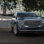 A grey 2020 GMC Acadia Denali is shown parked after viewing online GMC Acadia sales.