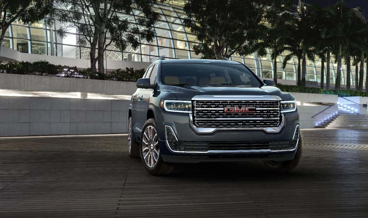 A grey 2020 GMC Acadia Denali is shown parked after viewing online GMC Acadia sales.