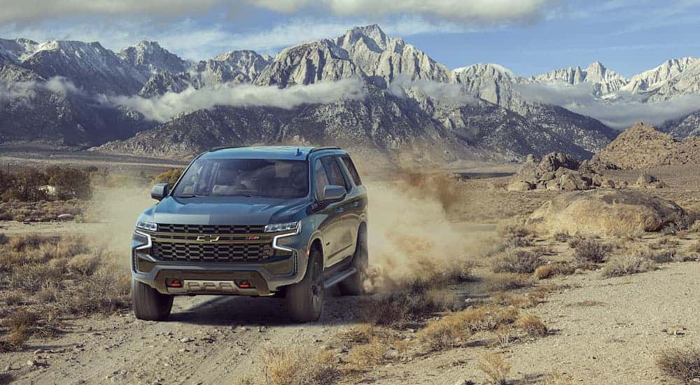 A silver 2022 Chevy Tahoe Z71 is shown from the front at an angle.