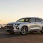 A silver 2019 Chevy Blazer is shown from the side after leaving a dealer with cars for sale in Washington DC.