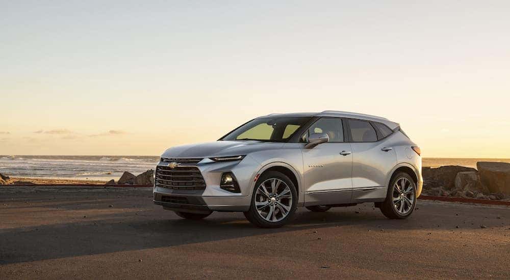 A silver 2019 Chevy Blazer is shown from the side after leaving a dealer with cars for sale in Washington DC.