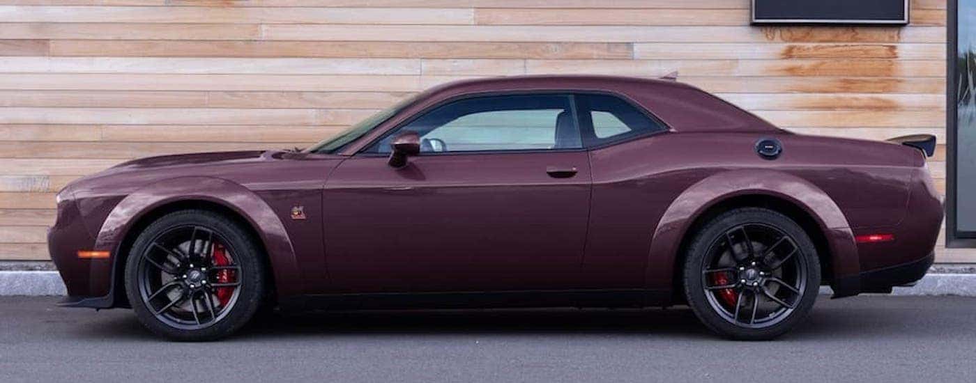 A purple 2022 Dodge Challenger Scat Pack is shown from the side.
