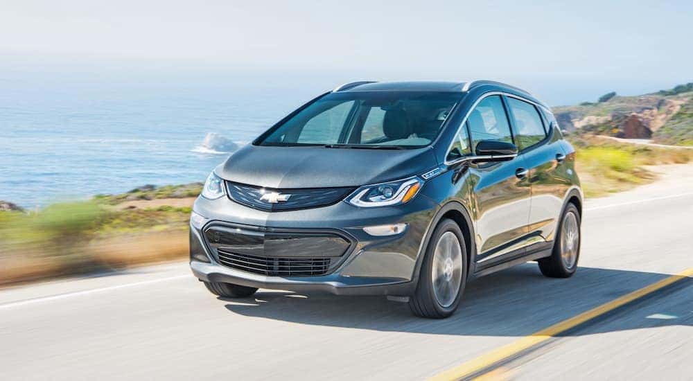 A grey 2020 Bolt EV is shown from the front at an angle.