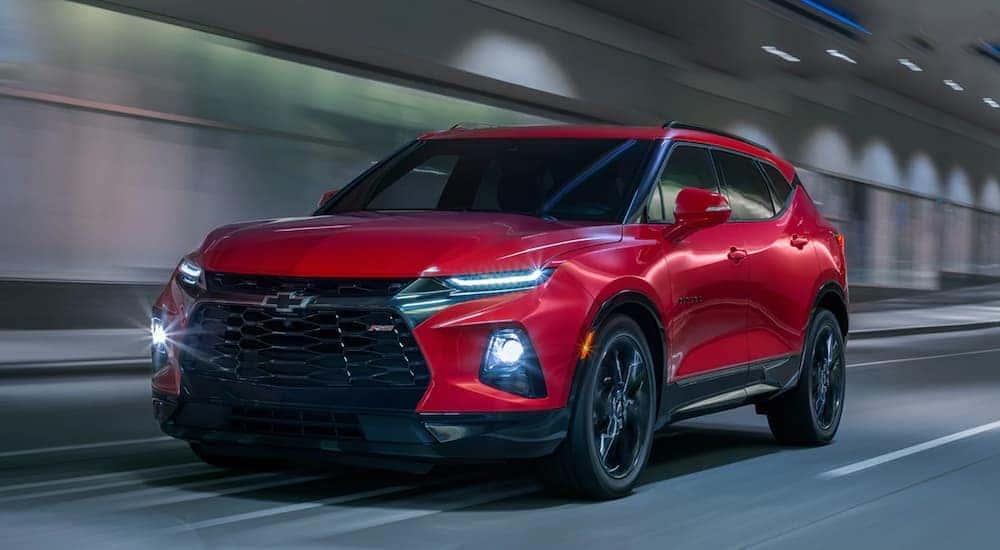 A red 2020 Chevy Blazer RS is shown from the front at an angle after leaving a dealer that handles Nashville SUV sales.