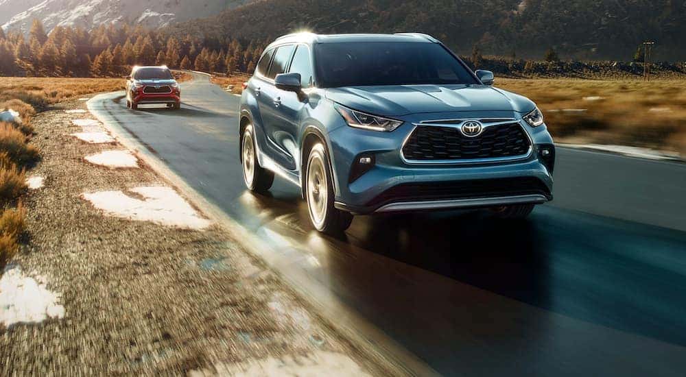 A blue 2020 Toyota Highlander is shown from the front at an angle.