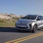 A silver 2022 Chevy Bolt EV for sale is shown from the front at an angle.