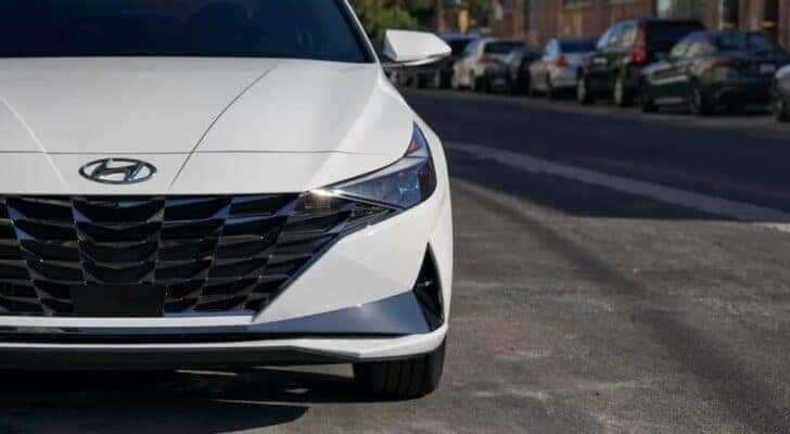 A close up shows the front of a 2021 Hyundai Elantra Hybrid.