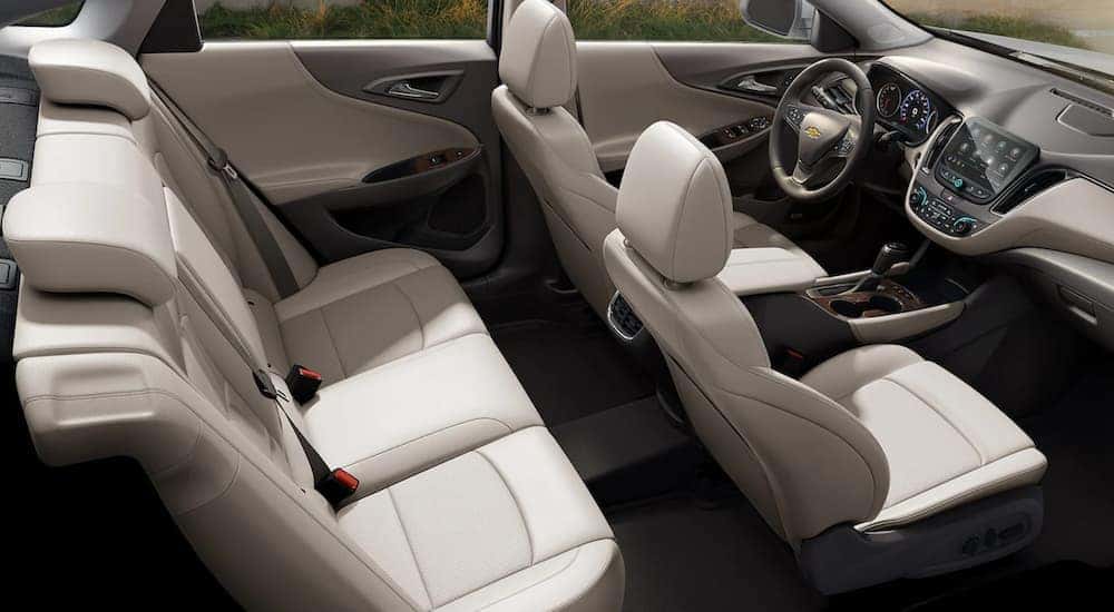 The interior of a 2022 Chevy Malibu is shown from a high angle.