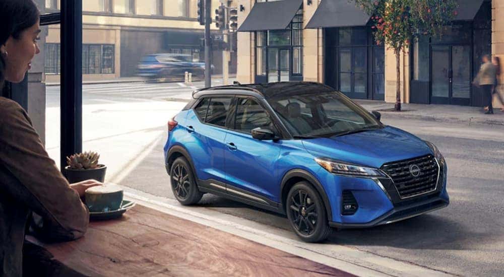 A blue 2023 Nissan Kicks SR is shown parked after viewing Columbus car sales.