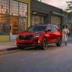 A red 2024 Chevy Equinox RS is shown parked after viewing Columbus SUV sales.