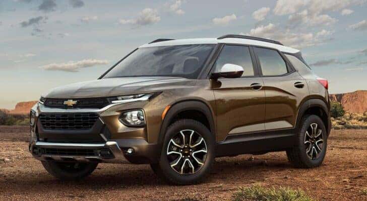 A brown 2021 Chevy Trailblazer for sale is shown parked off-road.