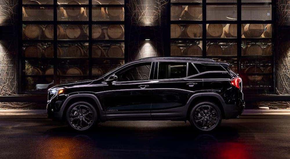 A black 2019 GMC Terrain for sale is shown from the side.