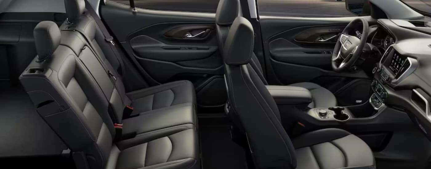 The black interior and seating in a 2023 GMC Terrain.