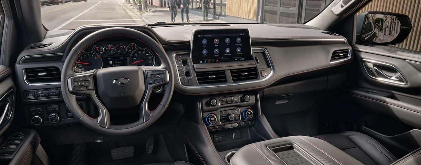The gray interior and dash in a 2021 Chevy Tahoe is shown.