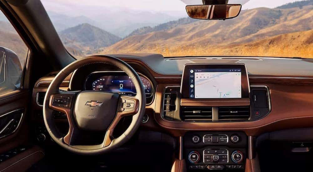 The brown interior and dash in a 2023 Chevy Tahoe for sale is shown.
