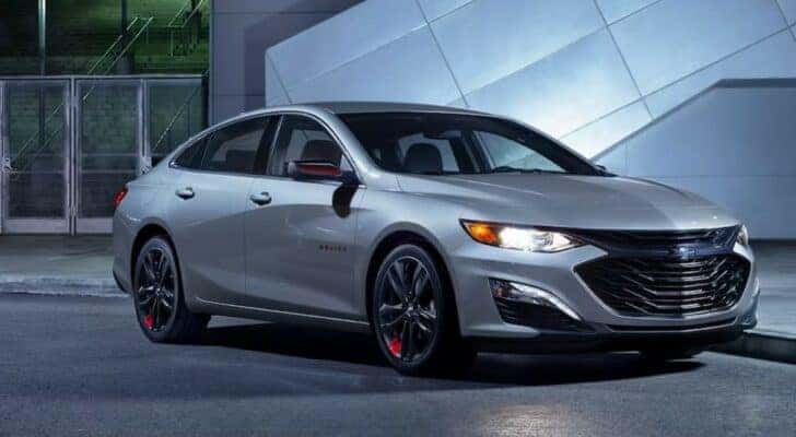 A silver 2024 Chevy Malibu 1LT is shown parked after viewing a Chevy Malibu for sale in Dallas.