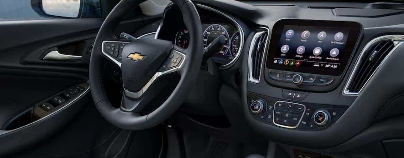 The black dash in a 2024 Chevy Malibu is shown.