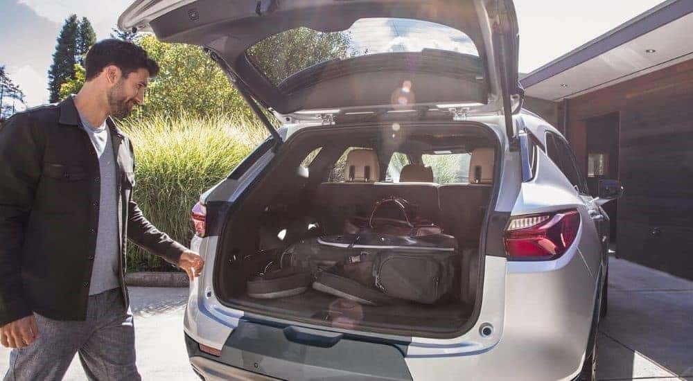 The open trunk of a silver 2022 Chevy Blazer for sale.