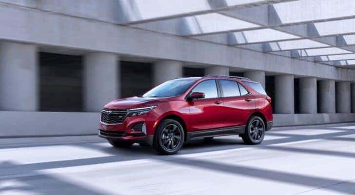 A red 2022 Chevy Equinox RS is shown from the front at an angle.