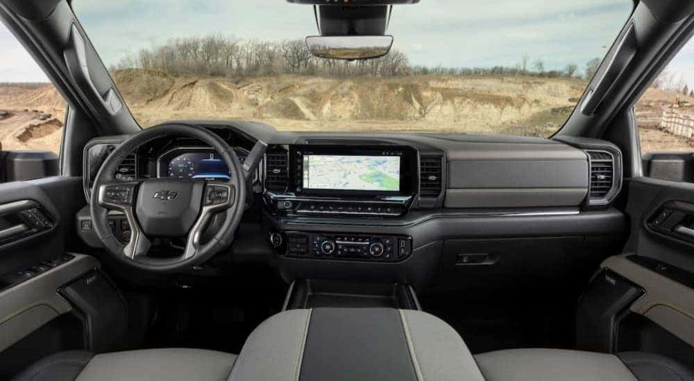 The black and gray interior and dash is shown in a 2024 Chevy Silverado 1500 ZR2.