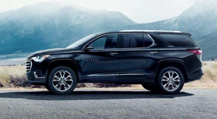A black 2021 Chevy Traverse High Country parked and angled left.