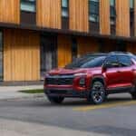 A red 2025 Chevy Equinox for sale in Cleveland is shown from the front at an angle.