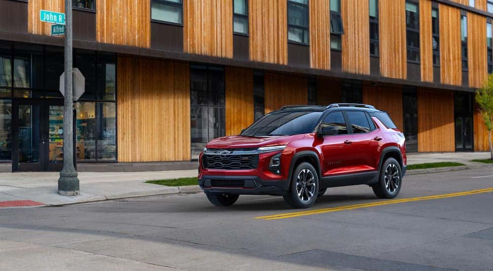 A red 2025 Chevy Equinox for sale in Cleveland is shown from the front at an angle.