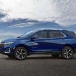 A blue 2023 Chevy Equinox for sale in Indianapolis is shown from the side.